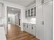 View of kitchen and entryway with hardwood floors and an open floor plan at 2615 Yellowstone Farm Dr, Cumming, GA 30028