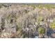 Property aerial view showcasing surrounding trees at 2046 Kinridge Ct, Marietta, GA 30062