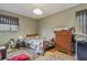 Cozy bedroom with wood floors and a dresser at 2046 Kinridge Ct, Marietta, GA 30062