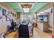 Quaint dining area with unique light fixture and adjacent kitchen access at 2046 Kinridge Ct, Marietta, GA 30062