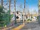 View of the home's exterior, highlighting the unique design and landscaping at 2046 Kinridge Ct, Marietta, GA 30062