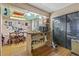 Kitchen features a pass-through to the dining area and a built-in shelving unit at 2046 Kinridge Ct, Marietta, GA 30062