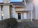 Two-story townhome with front entrance and landscaping at 4411 Idlewood Ln, Tucker, GA 30084