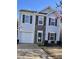 Charming two-story home with stone accents and a well-maintained front yard at 5140 Sky Ridge Way, Cumming, GA 30041