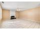 Spacious living room with fireplace and tile flooring at 643 Rangeley Meadows Ct, Hampton, GA 30228