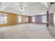 Expansive main bedroom with plush carpeting, trey ceilings, and generous space for a relaxing retreat at 643 Rangeley Meadows Ct, Hampton, GA 30228