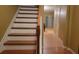 Interior view of a staircase with wooden steps and a wooden railing at 750 Arbor Gate Ln, Lawrenceville, GA 30044