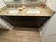 Double vanity bathroom with granite countertops at 221 Overlook Rd, Covington, GA 30014