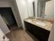 Double vanity bathroom with granite countertops and large mirrors at 221 Overlook Rd, Covington, GA 30014