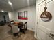 Bright dining area with a triangular table and four chairs at 221 Overlook Rd, Covington, GA 30014