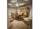 Elegant dining room with ornate furniture and a large china cabinet at 221 Overlook Rd, Covington, GA 30014
