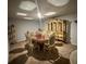 Elegant dining room with ornate furniture and a large china cabinet at 221 Overlook Rd, Covington, GA 30014