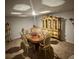 Elegant dining room with ornate furniture and a large china cabinet at 221 Overlook Rd, Covington, GA 30014