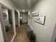 Bright and spacious entryway with a bench, mirror, and wood flooring at 221 Overlook Rd, Covington, GA 30014