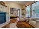 Main bedroom with hardwood floors and sitting area at 5143 Floyd Ne St, Covington, GA 30014