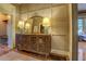 Entry hall showcasing a rustic console table and elegant wall paneling at 5143 Floyd Ne St, Covington, GA 30014