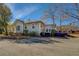 Side view of the house showcasing a charming exterior and a deck at 5143 Floyd Ne St, Covington, GA 30014