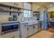 Modern kitchen with stainless steel appliances and ample counter space at 5143 Floyd Ne St, Covington, GA 30014
