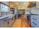 Modern kitchen with farmhouse sink and butcher block shelving at 5143 Floyd Ne St, Covington, GA 30014