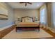 Spacious main bedroom with hardwood floors and large windows at 5143 Floyd Ne St, Covington, GA 30014