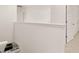 A hallway overlooking the kitchen and sink at 8589 Seabiscuit Rd, Lithonia, GA 30058