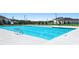 Community pool with marked depths is a great way to cool off on a hot summer day at 8589 Seabiscuit Rd, Lithonia, GA 30058