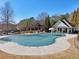 Relaxing community pool with a covered area perfect for entertaining at 1565 Horseshoe Creek Ln, Cumming, GA 30041