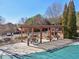 Covered pergola area with picnic tables at 1565 Horseshoe Creek Ln, Cumming, GA 30041