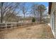 Spacious backyard with a wooden fence at 546 Paden Dr, Lawrenceville, GA 30044