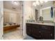 Bathroom with granite countertop vanity and shower at 546 Paden Dr, Lawrenceville, GA 30044