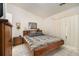 Large bedroom with king-size bed and direct access to a patio at 546 Paden Dr, Lawrenceville, GA 30044