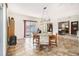 Bright dining room features a tiled floor and table with chairs, offering ample space for gatherings at 546 Paden Dr, Lawrenceville, GA 30044