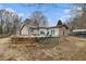 House exterior with deck and landscaping at 546 Paden Dr, Lawrenceville, GA 30044