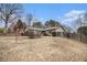 House exterior with landscaping and driveway at 546 Paden Dr, Lawrenceville, GA 30044