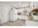 Bright kitchen with white cabinets, granite counters, and ample counter space at 546 Paden Dr, Lawrenceville, GA 30044