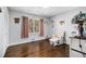 bedroom with rocking chair and hardwood floors at 6492 Swift Creek Rd, Lithonia, GA 30058