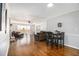 Bright living room with hardwood floors, fireplace, and ample natural light at 6492 Swift Creek Rd, Lithonia, GA 30058