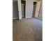 Spacious bedroom with gray walls and carpeted floors at 658 Austin Creek Dr, Buford, GA 30518