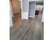 Dining area with gray walls and wood-look flooring at 658 Austin Creek Dr, Buford, GA 30518