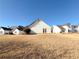 Large backyard with view of neighboring homes at 12384 Riviera Dr, Fayetteville, GA 30215