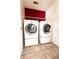 Laundry room with washer and dryer included at 12384 Riviera Dr, Fayetteville, GA 30215