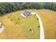 Aerial view showcasing house and surrounding landscape at 350 Taylor Path, Dallas, GA 30157