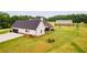 Aerial view of house, detached garage, and large lot at 350 Taylor Path, Dallas, GA 30157