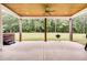Covered patio with hot tub, grill, and wooded views at 350 Taylor Path, Dallas, GA 30157