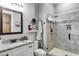 Bathroom with granite countertop, white cabinets, and shower at 350 Taylor Path, Dallas, GA 30157