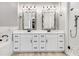 Double vanity bathroom with white cabinets and large mirrors at 350 Taylor Path, Dallas, GA 30157