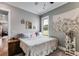 King-size bed and stylish decor in spacious bedroom at 350 Taylor Path, Dallas, GA 30157