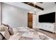 Main bedroom with a view of the ensuite bathroom and large TV at 350 Taylor Path, Dallas, GA 30157