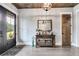 Bright entry with wood floors, console table, and a view to the backyard at 350 Taylor Path, Dallas, GA 30157