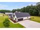 House exterior showcasing a side view and attached garage at 350 Taylor Path, Dallas, GA 30157